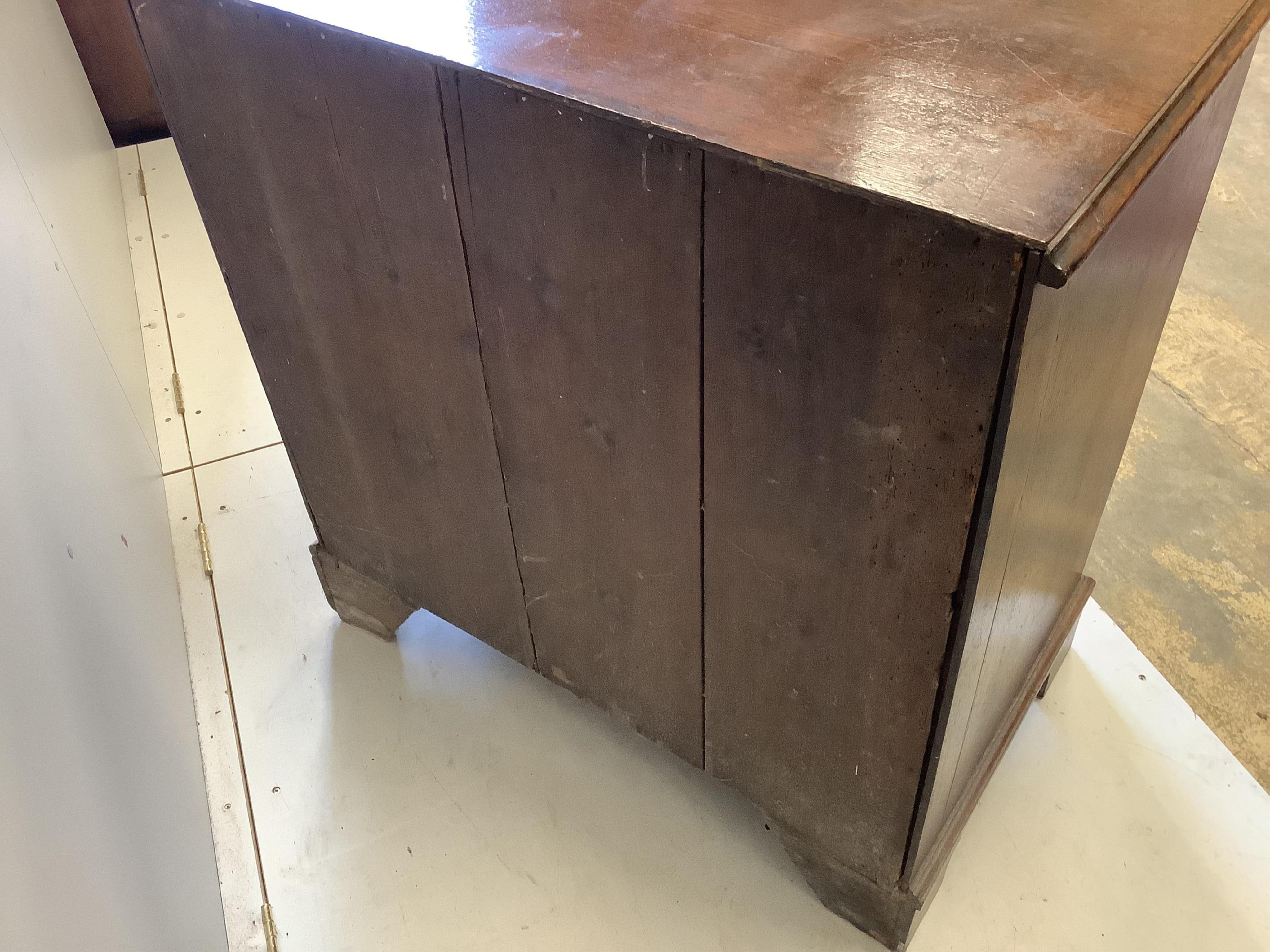 An early 18th century oak chest, fitted with two short and two long drawers, width 91cm, depth 51cm, height 94cm. Condition - fair